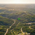 Gallery thumbnail: 0.39 Acres • Wooded Hillside Views + Backing Seasonal Creek • Land for Sale in Carroll County, Arkansas • AR0002